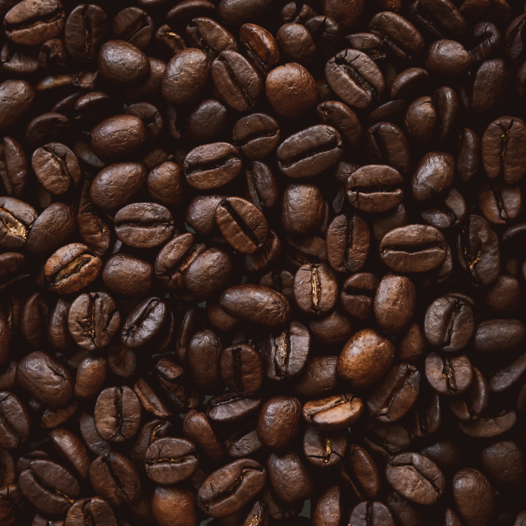 Fresh roasted coffee beans in a flatlay view - How long to wait before enjoying fresh coffee and how degassing is important for best flavours