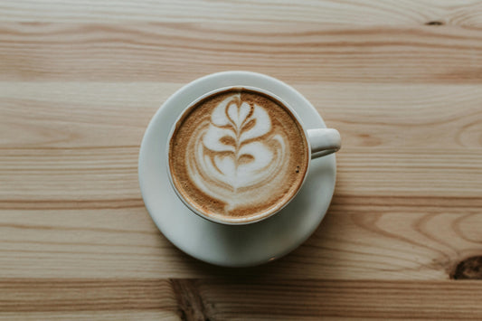 A Flat white with a latte art on top.