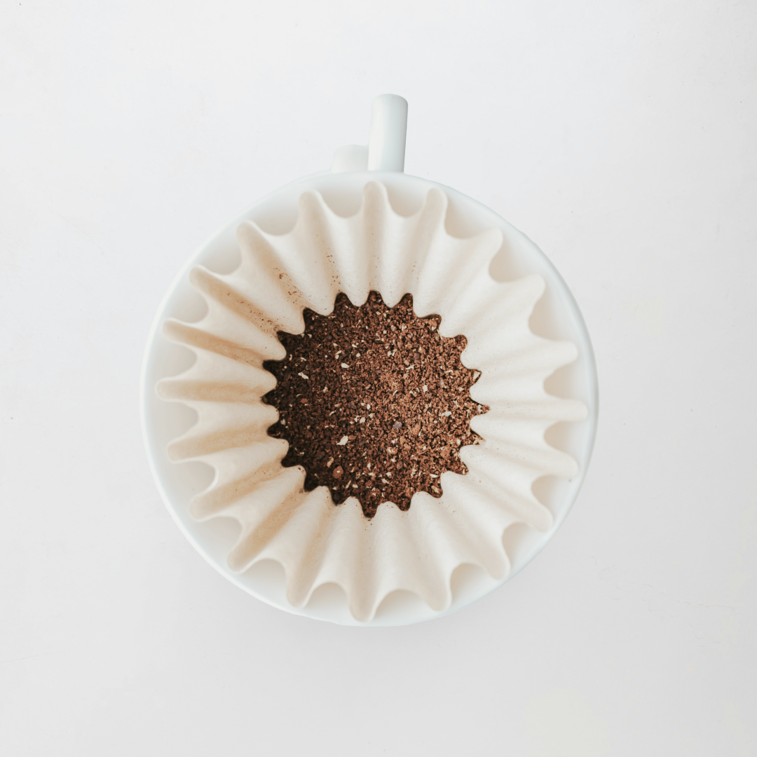 A overhead shot of a brew bed that is ready to be brewed fresh with After Hours Coffee Filter Roast Collection